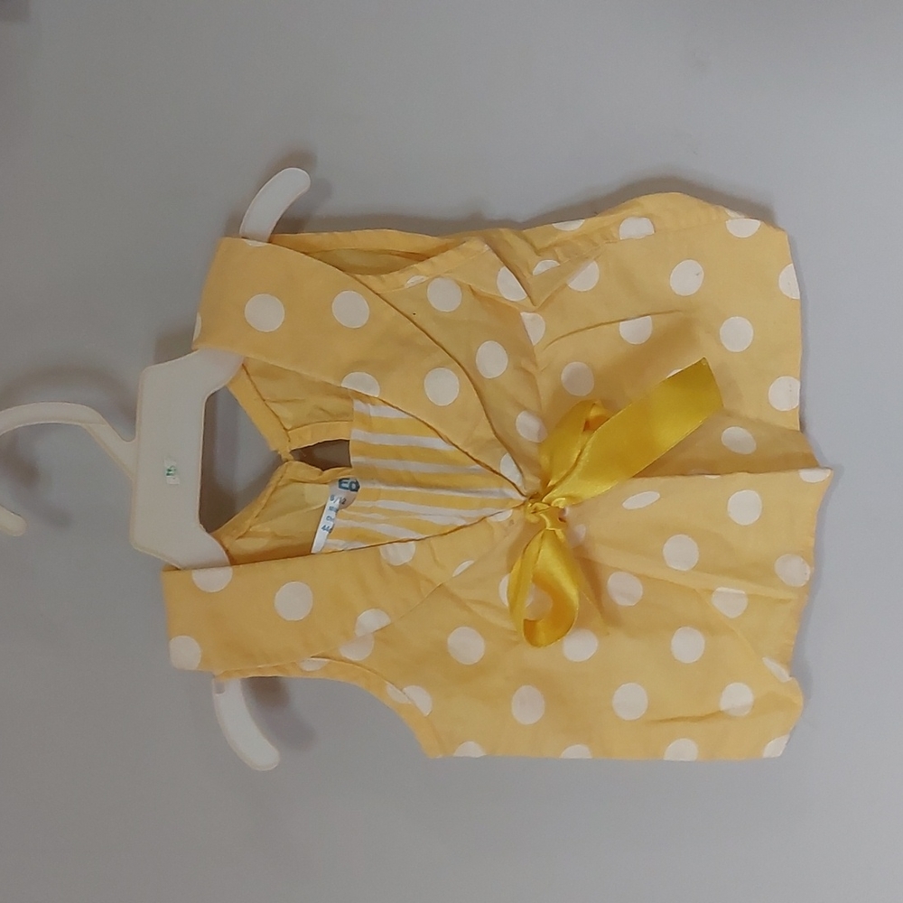 Yellow poke-a-dot shirt
